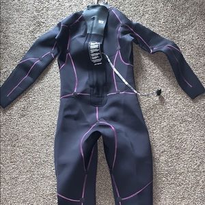 Women’s Synergy Triathlon Wetsuit. Never worn..  Size WX